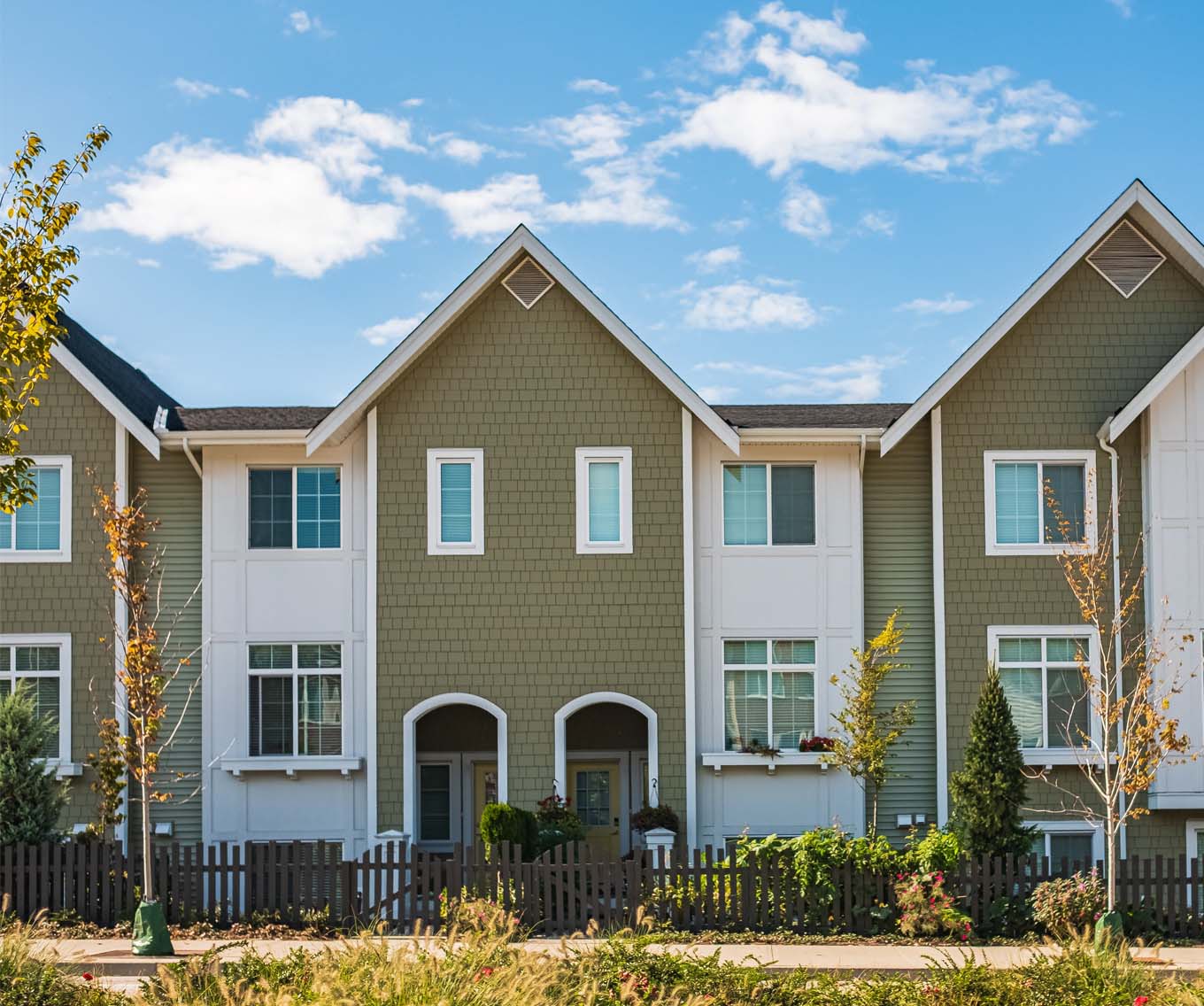 Exterior of building that could be a condo or a townhouse.