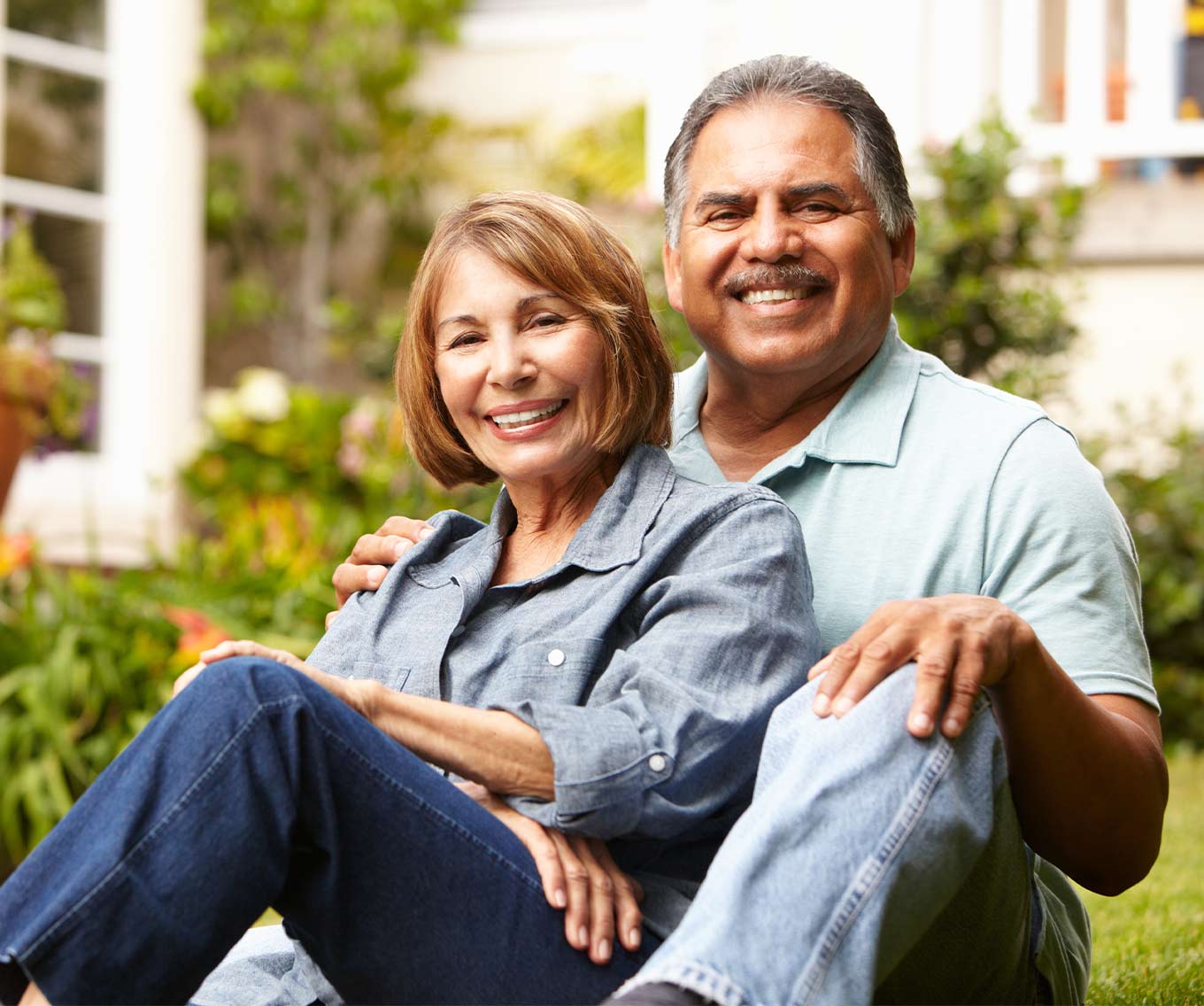 Couple sitting outside.