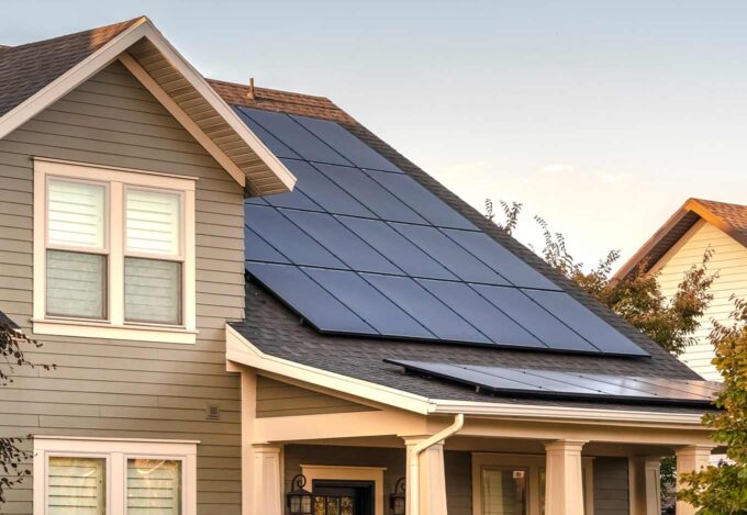 Home purchased using an energy-efficient mortgage features solar panels on the roof.