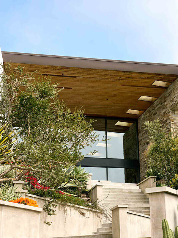 Entrance to a modern luxury home purchased using a jumbo loan.