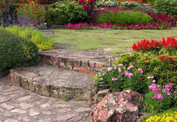 Garden featuring a mix of flowers that flourish in the homeowners plating zone.