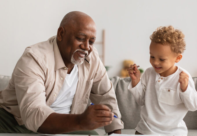Sixty-two year old grandfather considers the pros and cons of reverse mortgage with his grandchild.