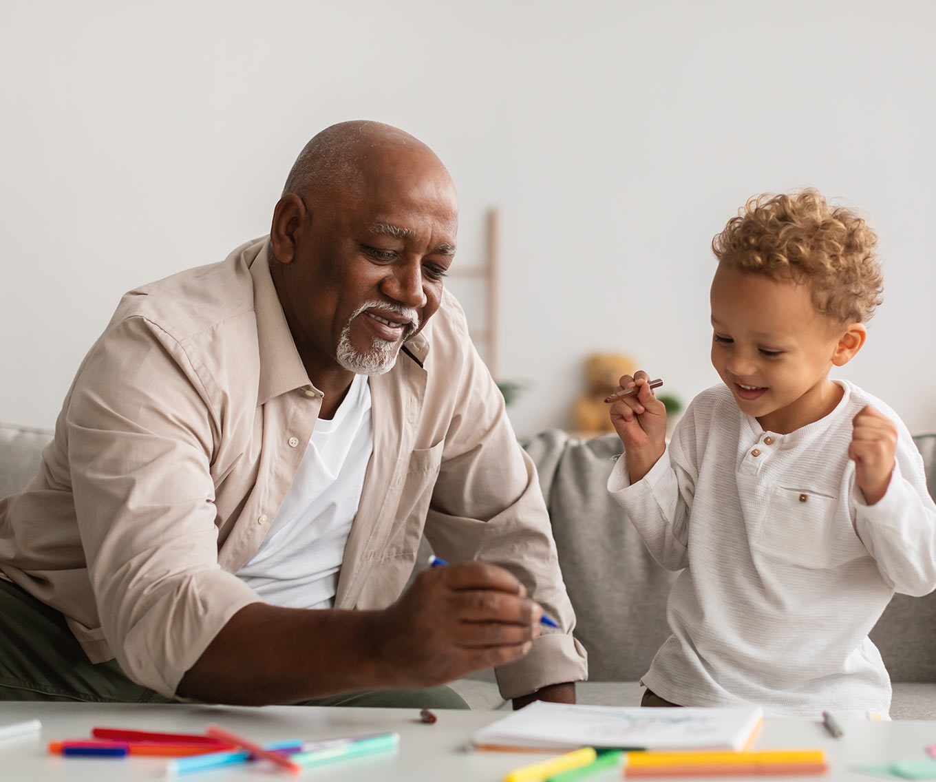 Sixty-two year old grandfather considers the pros and cons of reverse mortgage with his grandchild.